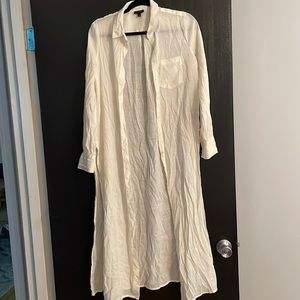 who what wear white top/coverup